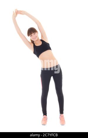 Teenager-Mädchen in Sportkleidung Stretching isoliert auf weißem Hintergrund Stockfoto