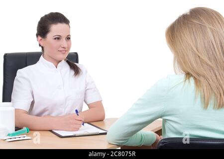 Junge Ärztin im Büro mit Patientin sprechen Stockfoto