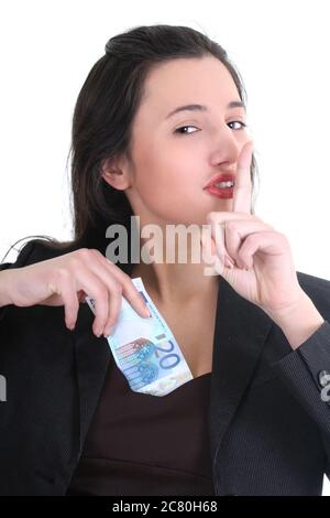 Geschäftsfrau versteckt Geld und tun shh Zeichen über weiß Stockfoto