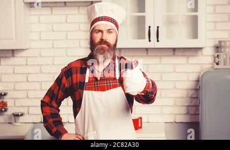 Professioneller Koch Mann zeigt Zeichen für lecker. Stockfoto