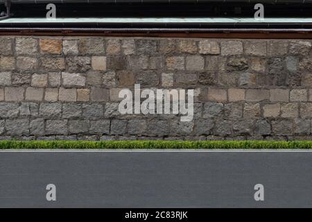 Straßenmauer Hintergrund, industrieller Hintergrund, leere Grunge städtische Straße mit Lagerhaus Ziegelmauer Stockfoto