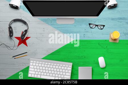 Djibouti Flagge Hintergrund mit Kopfhörer, Computer-Tastatur und Maus auf nationalen Büro Schreibtisch Table.Top Ansicht mit Copy Space.Flat Lay. Stockfoto