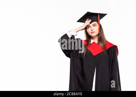 Bildung Thema: Studium Studentin in einem akademischen Kleid. Isoliert auf weißem Hintergrund. Stockfoto