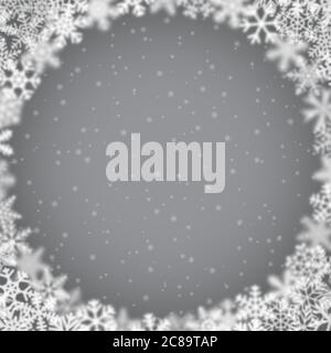 Weihnachtliche Hintergrund von Schneeflocken unterschiedlicher Form, Unschärfe und Transparenz, in einem Kreis angeordnet, auf grauem Hintergrund Stock Vektor