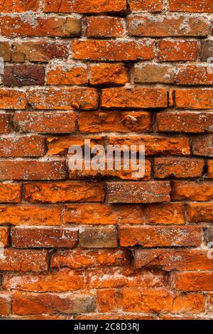 Ein alter roter Backsteinwand Hintergrund Stockfoto