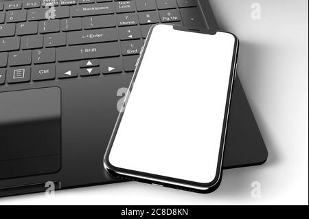 Modell eines modernen Smartphones auf einem Laptop. 3D-Illustration Stockfoto