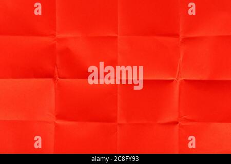 Nahaufnahme von rotem gefaltetem Papier für Hintergründe Stockfoto