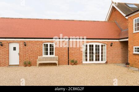 Wohnimmobilien-Ergänzung (Scheune Umbau), um eine einstöckige Anlage zu einem britischen Haus Stockfoto