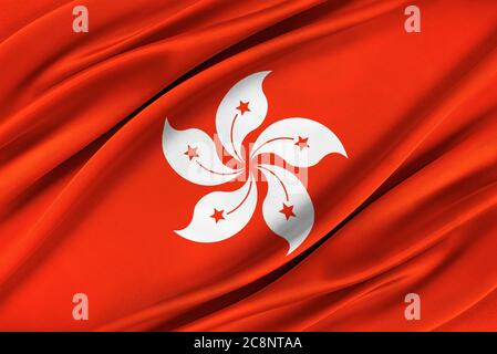 Bunte Hongkong Flagge winkt im Wind. Stockfoto