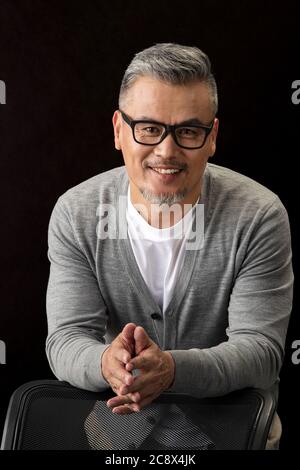 Glückliches Porträt mittleren Alters und alter Männer Stockfoto