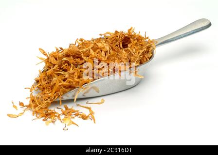 Getrocknete Blüten von Calendula, Calendula officinalis. Pharmazeutisch werden die getrockneten Blütenköpfe verwendet. Das Arzneimittel reduziert Entzündungen und Stockfoto