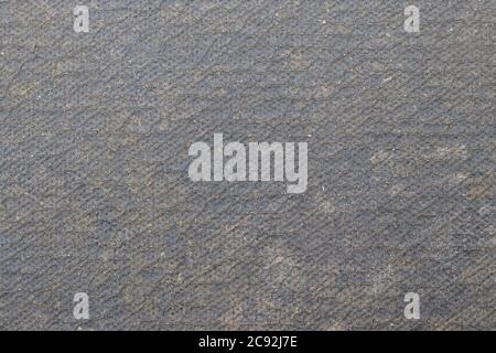 Grauer struktureller Hintergrund. Graue Wand. Stockfoto