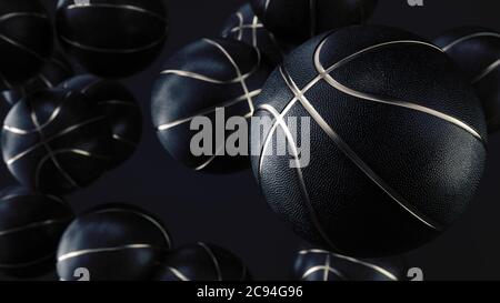 Viele schwarze Basketballbälle mit Gold Metallic Line in einem endlosen Stapel von vorne gesehen. Dunkler Hintergrund. Futuristisches Sportkonzept. Nahaufnahme. Abt. Stockfoto