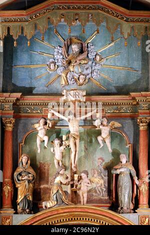 Saint Maurice Kirche. Barocker Tisch. Jesus am Kreuz. Thones. Frankreich. Stockfoto