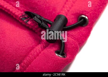 Kordelzug innen einer rosa Sportjacke, Nahaufnahme Stockfoto