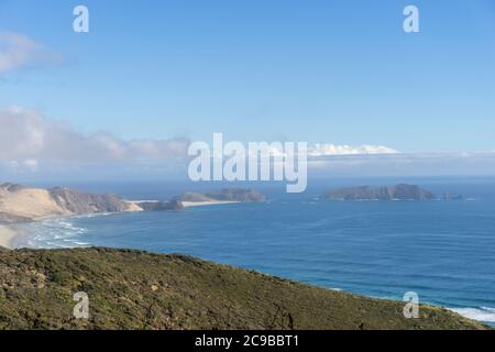 Cape Reinga North New Zealand Reiseziel. Blick auf den See, wo die Tasmanische See auf den Pazifischen Ozean trifft. Stockfoto