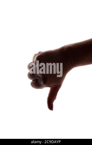 Weibliche Hand zeigt Abneigung - Silhouette, Konzept schlecht Stockfoto