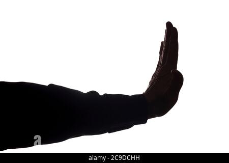 Die Hand des alten Mannes zeigt ein Symbol für einen Stopp, Verleugnung, Uneinigkeit - Silhouette Stockfoto