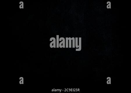 Weathered and aged concrete wall textured background. Dark, almost black, high resolution abstract textured background in black and white. Stockfoto