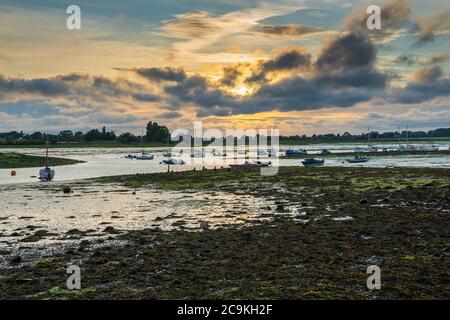 Bosham Quay bei Chichester in West Sussex bei Sonnenuntergang. West Sussex. Stockfoto