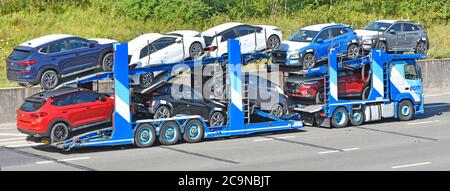 Seitenansicht ECM Transport & Car Delivery Business LKW transportrampen beladen mit neun neuen unregistrierten Autos Autobahn England Großbritannien Stockfoto