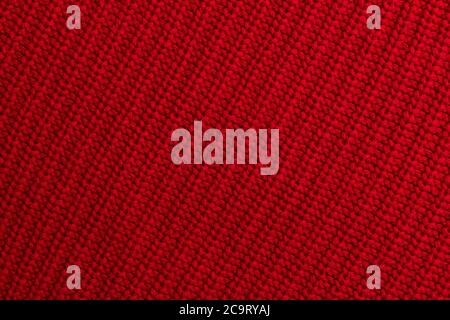 Rot gestrickt Wollstoff Hintergrund Stockfoto