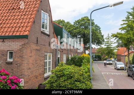 Sozialer Wohnungsbau für die Arbeiterklasse, entwickelt von dem Architekten Willem Marinus Dudok zu Beginn des 20. Jahrhunderts in Hilversum, Niederlande Stockfoto