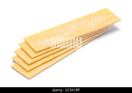 Stapel Gelbes Gummi isoliert auf Weiß. Stockfoto