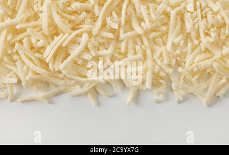 Rasierte Parmesan-Käse Hintergrund Stockfoto