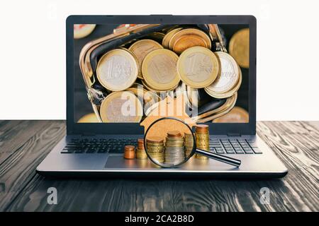 Konzept des Verkaufs und der Vermietung von Wohnungen, Hypotheken, Darlehen. Laptop mit leerem Bildschirm und Haufen von Euro-Münzen, Modell eines Hauses Stockfoto