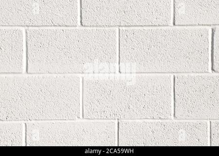 Nahaufnahme der weiß lackierten Betonblock Wand Hintergrundstruktur Stockfoto