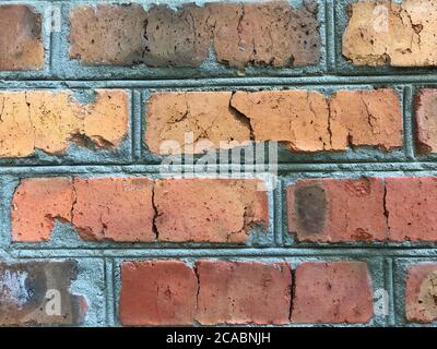 Eine alte Ziegelwand, die Details aus der Nähe zeigt Stockfoto