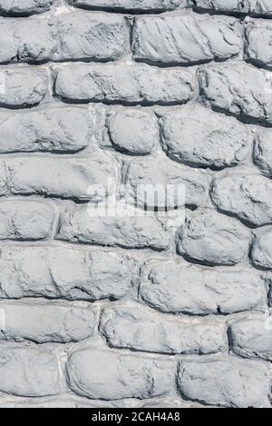 Fulframe Teil einer Wand mit grauem Mauerwerk. Alte Burg Stein Wand Textur Hintergrund. Steinwand als Hintergrund oder Textur. Teil einer Steinmauer für b Stockfoto