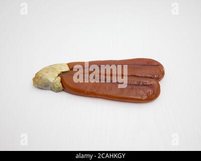 Bottarga, der getrocknete, gepresste Rogen der Meeräsche, wird in der sardischen Küche verwendet Stockfoto