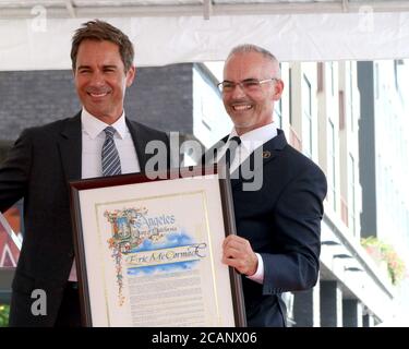 LOS ANGELES - SEP 13: Eric McCormack, Mitch O'Farrell bei der Eric McCormack Star Ceremony auf dem Hollywood Walk of Fame am 13. September 2018 in Los Angeles, CA Stockfoto