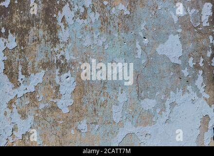 Blaue, beige alte Grunge-Wand mit geschältem Putz Stockfoto
