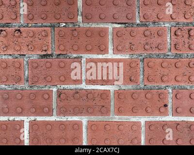 Rot angehoben kreisförmige Nahaufnahme Vintage-Muster Ziegel pflastern, reiche Farben und Schatten geeignet für Website Hintergrund Marketing Hintergründe Stockfoto