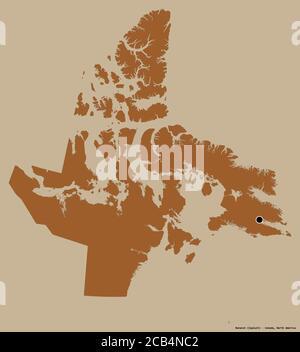 Form von Nunavut, Gebiet von Kanada, mit seiner Hauptstadt isoliert auf einem einfarbigen Hintergrund. Komposition von gemusterten Texturen. 3D-Rendering Stockfoto