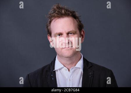 Der britische Autor und Journalist Andrew Wilson nimmt an einer Fotozelle Teil Das jährliche Edinburgh International Book Festival 2018 Stockfoto