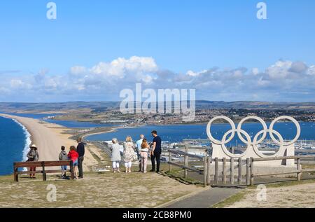 Die Olympic Rings Stone Sculpture auf der Isle of Portland feiert die London 2012 Segelveranstaltungen in Portland & Weymouth, in Dorset, Großbritannien Stockfoto