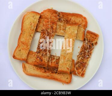 Knoblauch Käse Brot Toast, mit Kräutern, Frühstück am Morgen Stockfoto