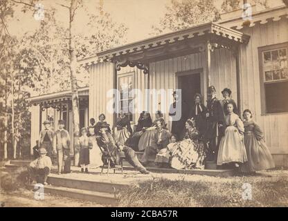 Gruppe auf der Veranda, 1860er Jahre. Stockfoto