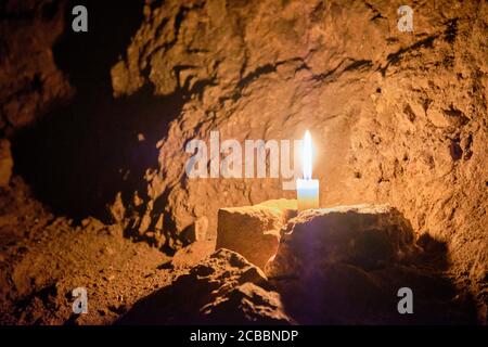 Kerze in Clearwell Caves, Clearwell, Forest of Dean, Gloucesterhire Stockfoto