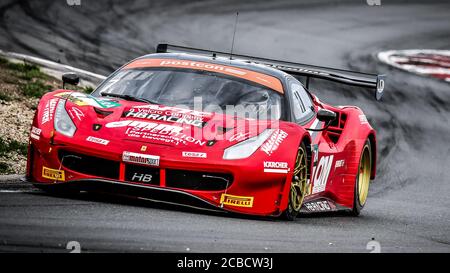 Oschersleben, Deutschland, 26. April 2019: Der deutsche Pilot Sebastian Asch fährt einen Ferrari 488 GT3 während des GT-MEISTERWAGENRENNENS in der Motorsport Arena Stockfoto