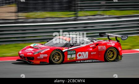 Oschersleben, Deutschland, 28. April 2019: Sebastian Asch fährt mit seinem Ferrari 488 GT3 während des GT-MEISTERWAGENRENNENS in der Motorsport Arena in Deutschland. Stockfoto