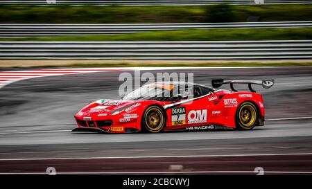 Oschersleben, Deutschland, 28. April 2019: Der Deutsche Sebastian Asch fährt seinen Ferrari 488 während des GT-MEISTERWAGENRENNENS in der Motorsport Arena Stockfoto