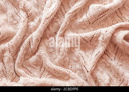 Schöne beige abstrakt gestrickt Stoff Hintergrund, Textur. Stockfoto