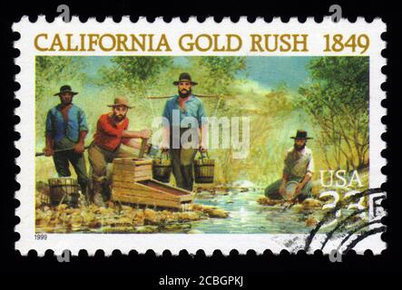 London, UK, 5. Februar 2011 - Jahrgang 1999 USA abgesagt Briefmarke zeigt ein Bild von California Gold Rush Bergleute schwenken für Goldstempel sammeln Stockfoto