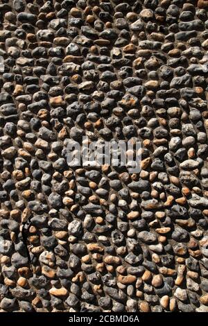 Nahaufnahme einer flinten Kopfsteinpflasterwand in Worthing, West Sussex, Großbritannien Stockfoto