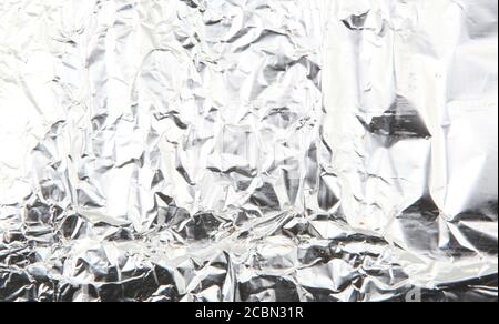 Geschrumpfte glänzende Aluminiumfolienoberfläche Stockfoto